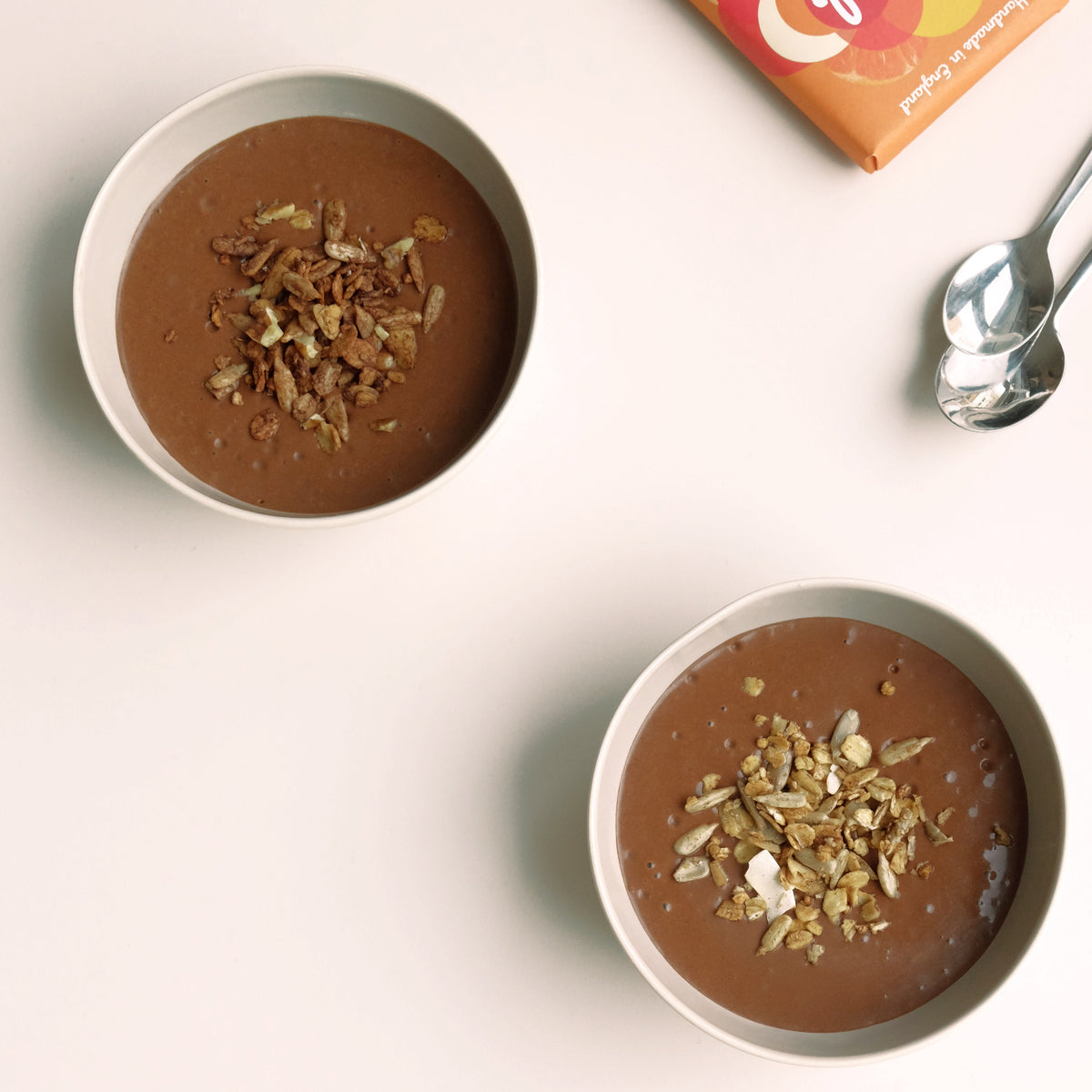Vegan chocolate ganache pudding topped with crunchy oats