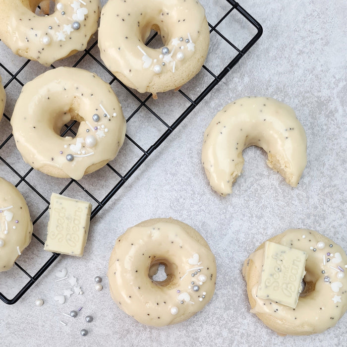 Lemon poppy seed doughnuts with white chocolate glaze