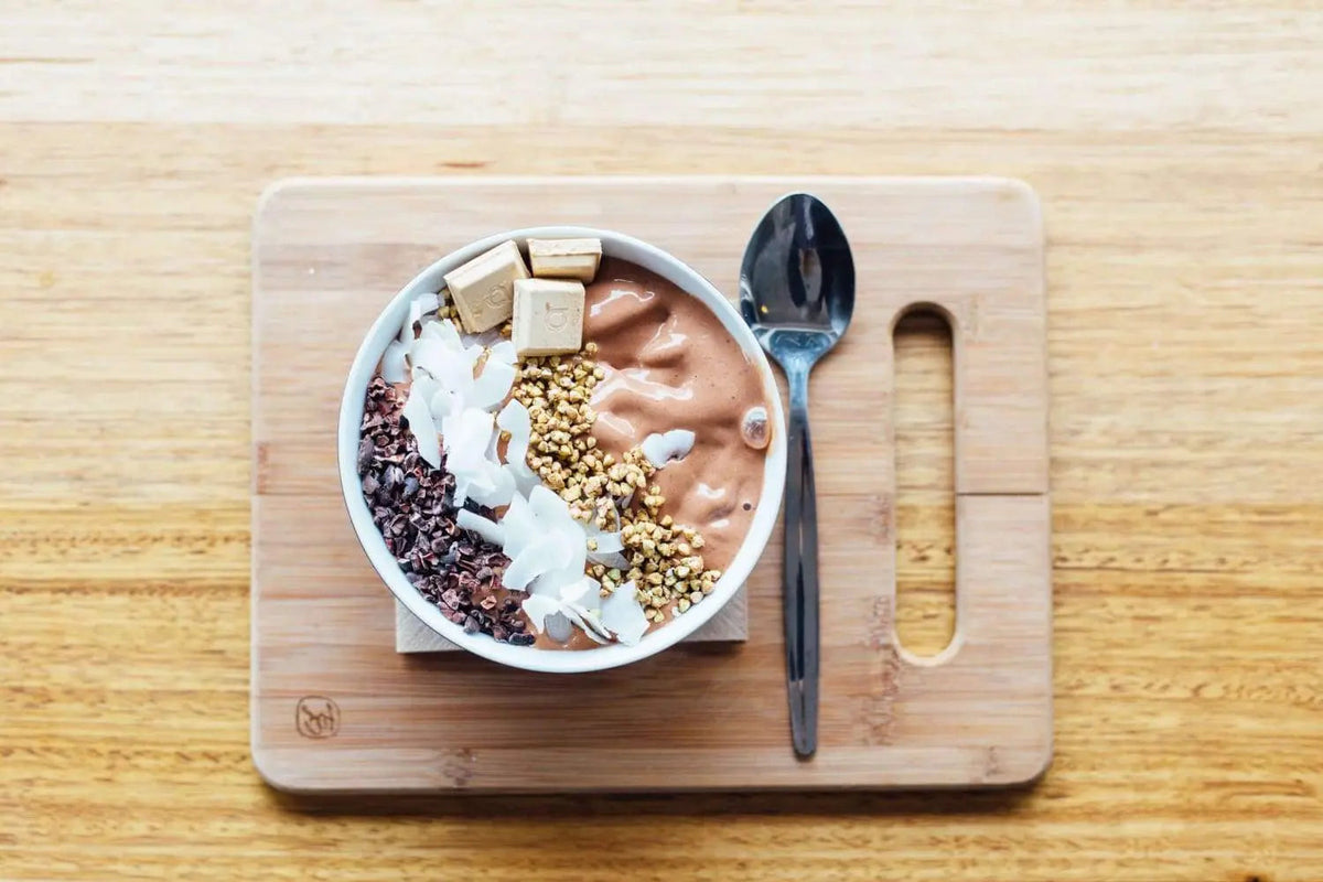 Chocolate breakfast bowl with fresh fruit