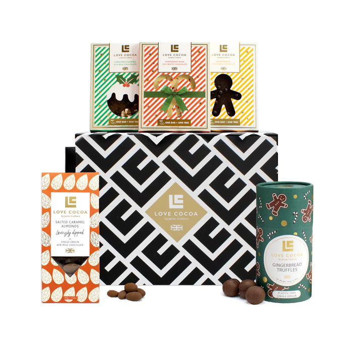 Corporate Christmas chocolate gifts stacked with festive ribbon