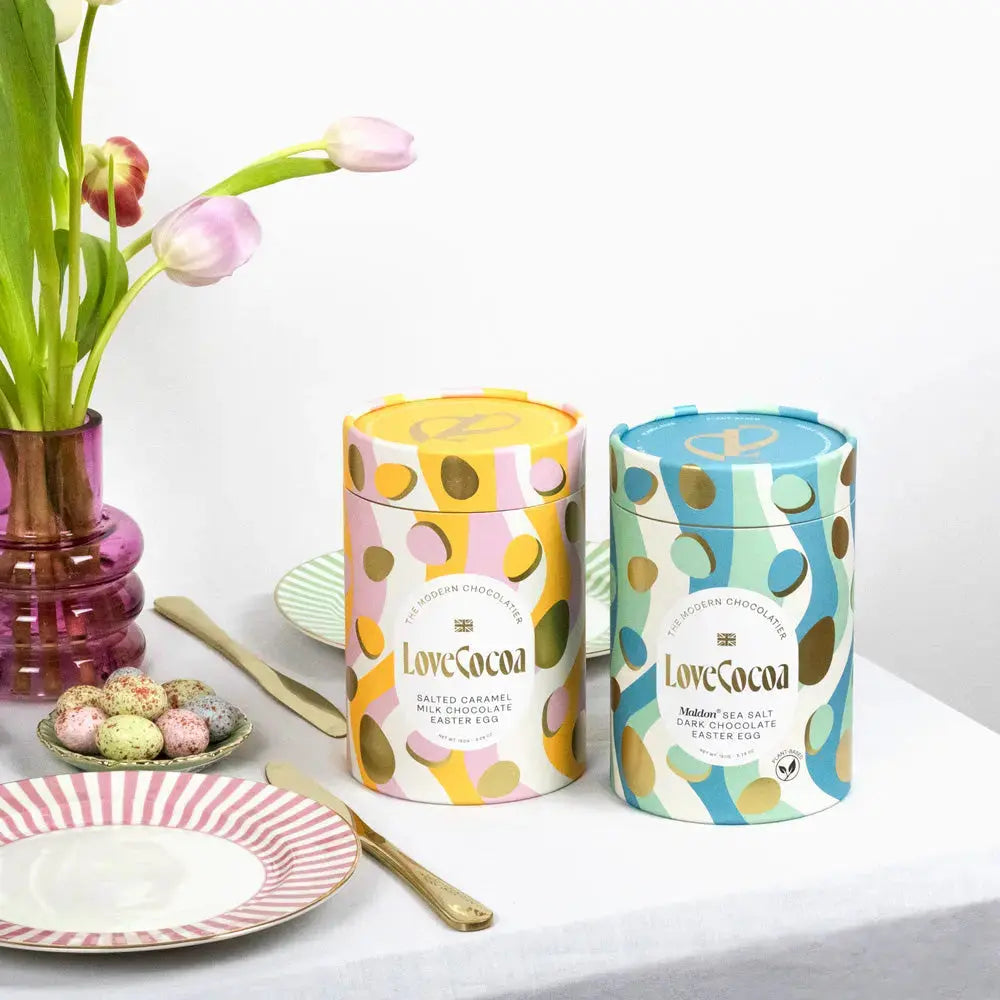 Three Love Cocoa luxury Easter eggs with their packaging