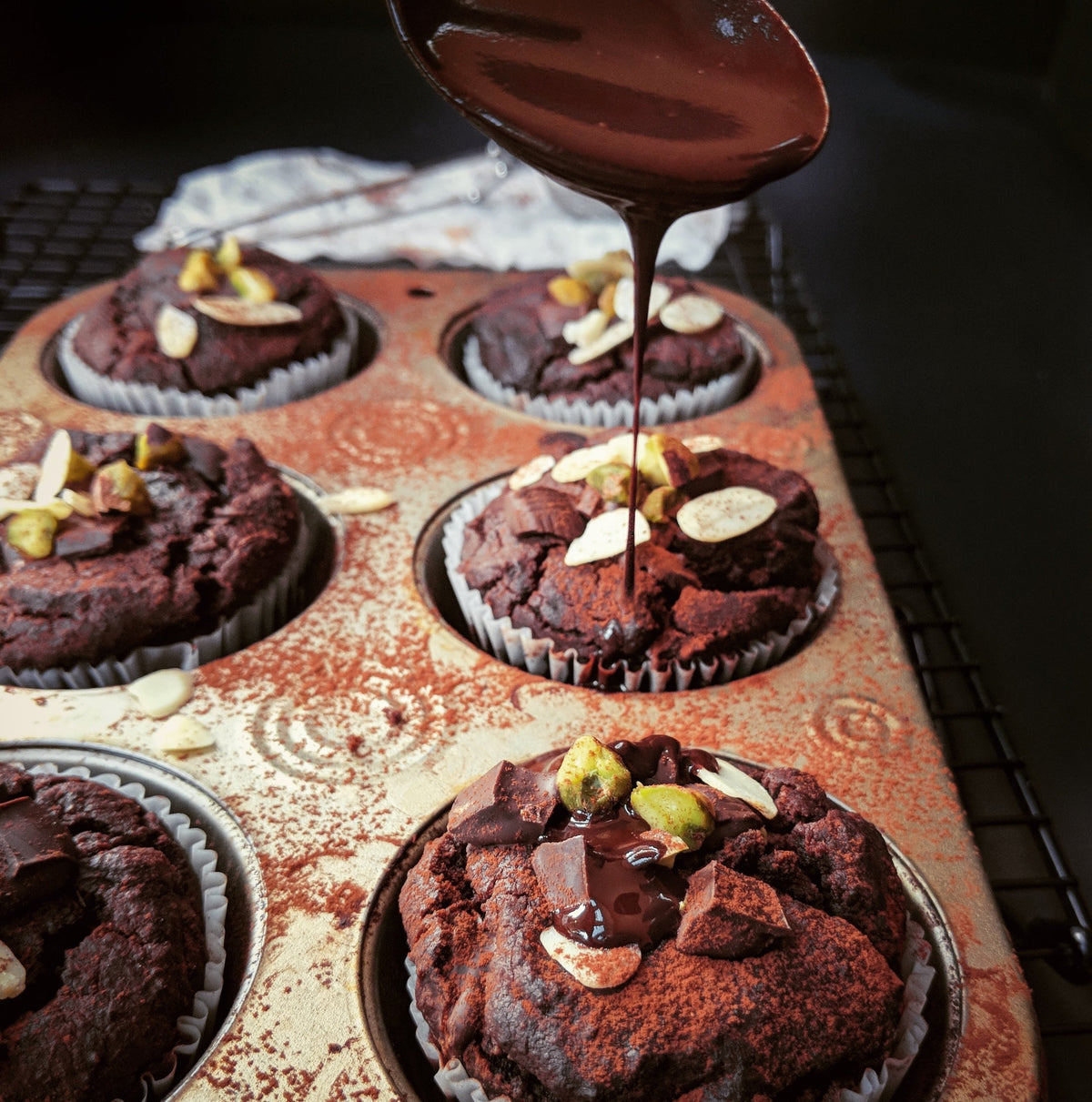 Dark chocolate quinoa protein muffins on a plate
