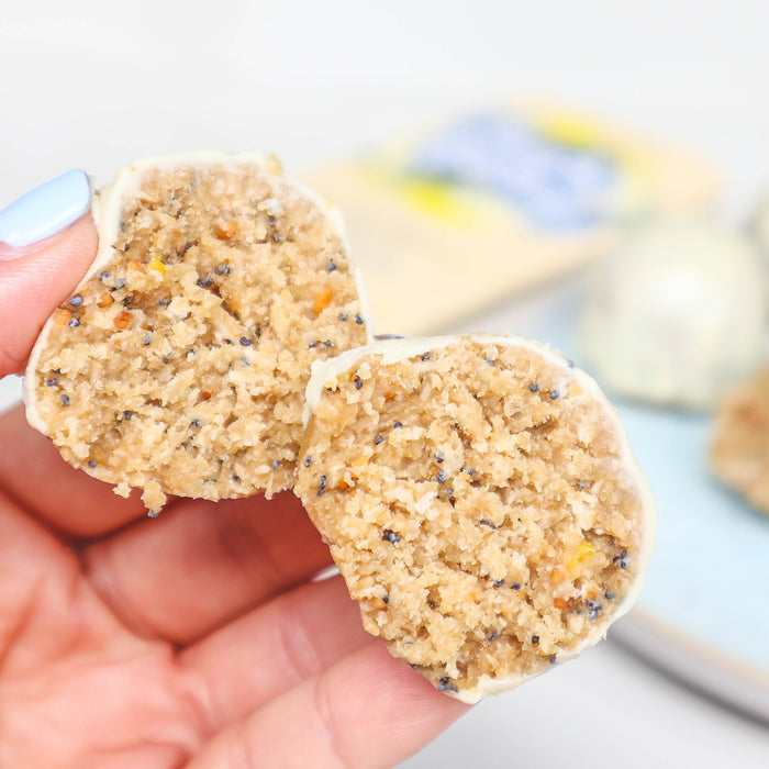Lemon poppy seed snack balls coated in white chocolate