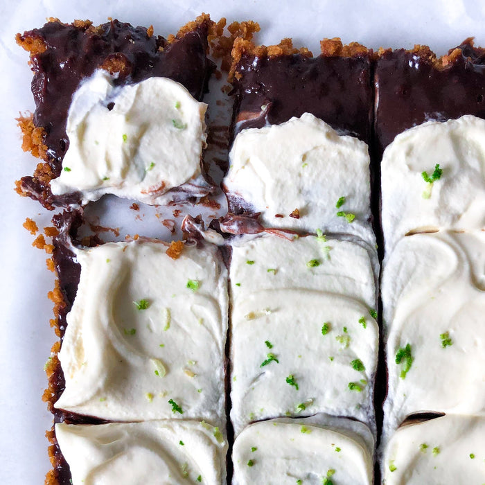 Slice of chocolate and lime tart with ginger base