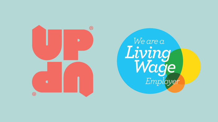 Living Wage Employer badge with UP-UP chocolate