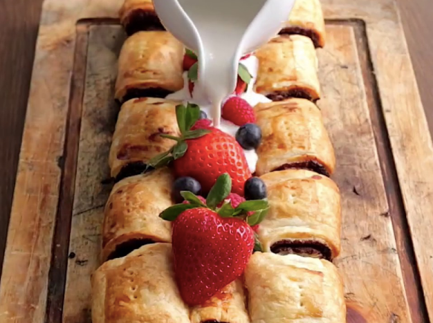 Pain au chocolat pastries served with fresh berries