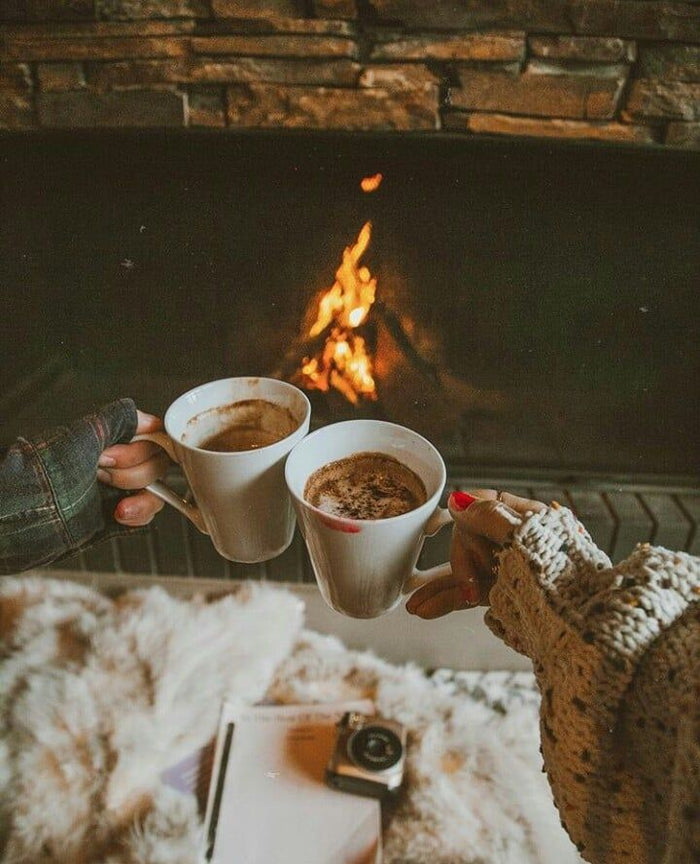 Rich hot chocolate in a mug on a winter evening