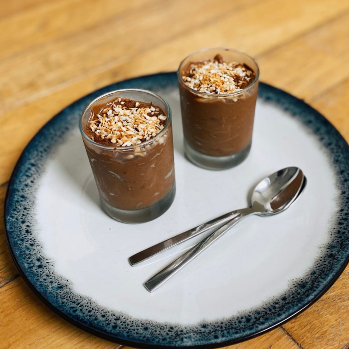 Avocado salted caramel chocolate mousse topped with grated chocolate