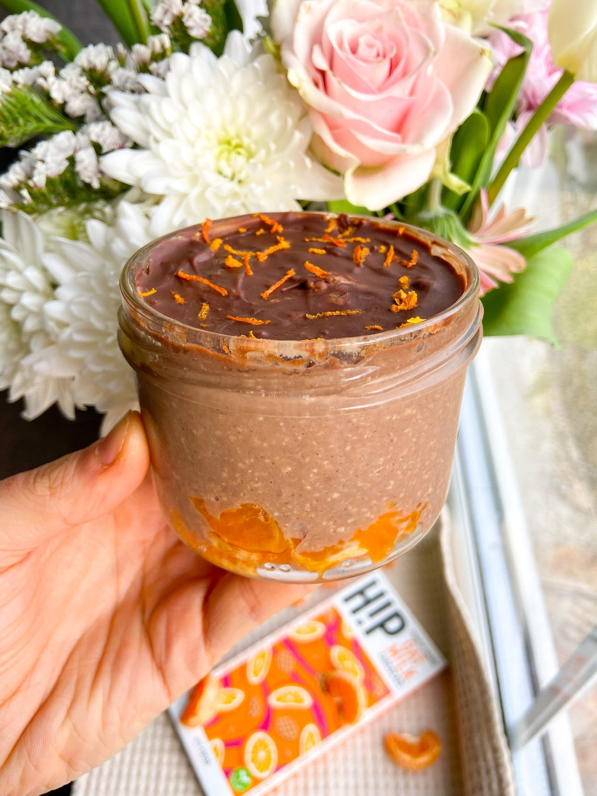 Jar of orange chocolate overnight oats