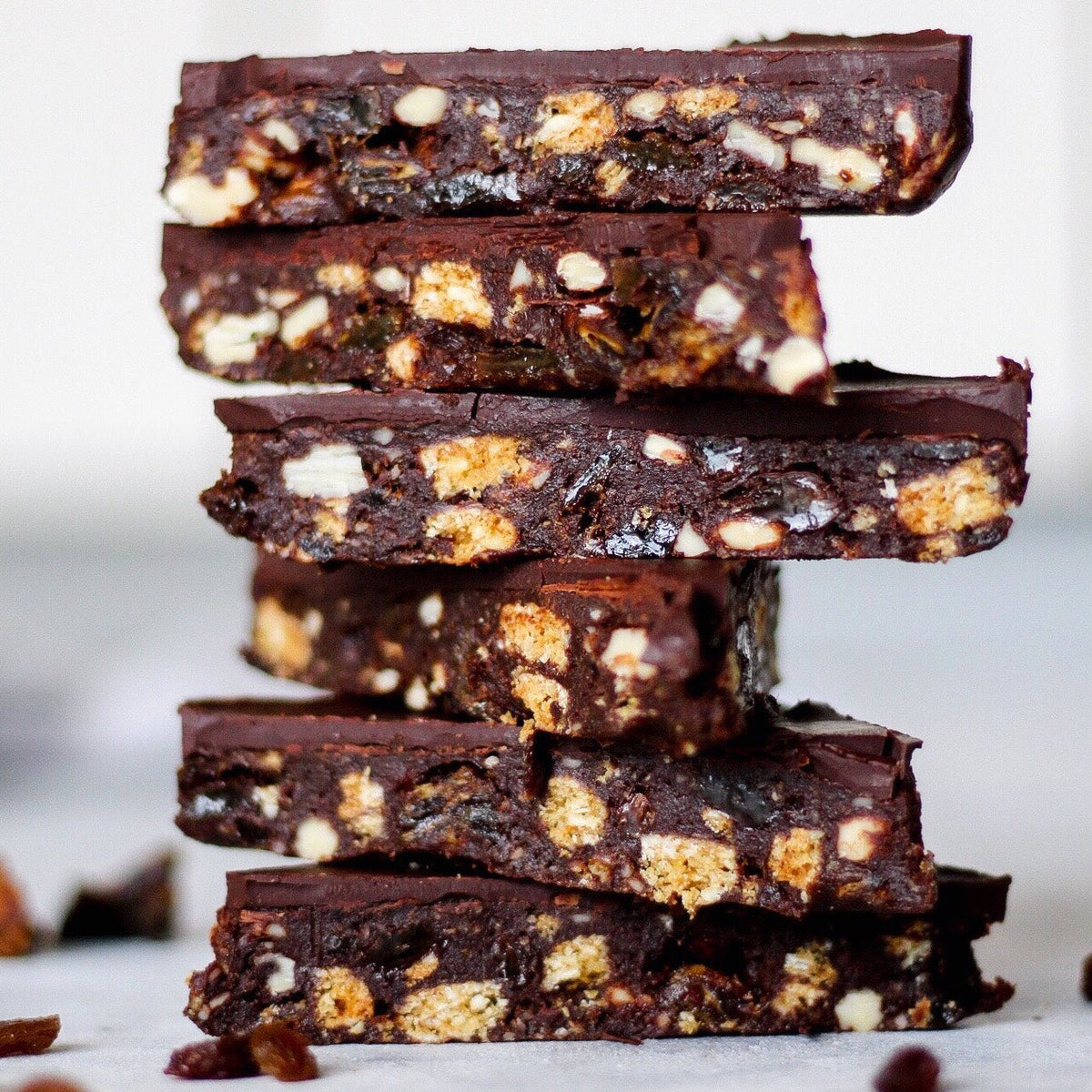 Chocolate espresso tiffin squares with a cup of tea