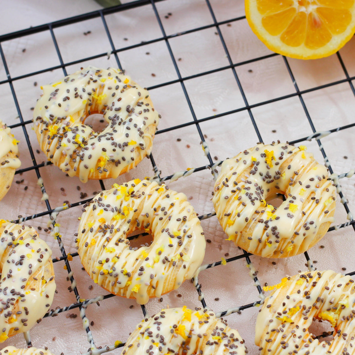 Lemon poppy seed doughnuts with white chocolate glaze