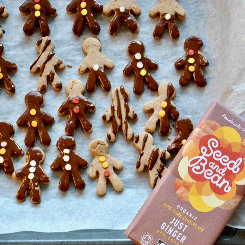 Decorated gingerbread men with dark chocolate