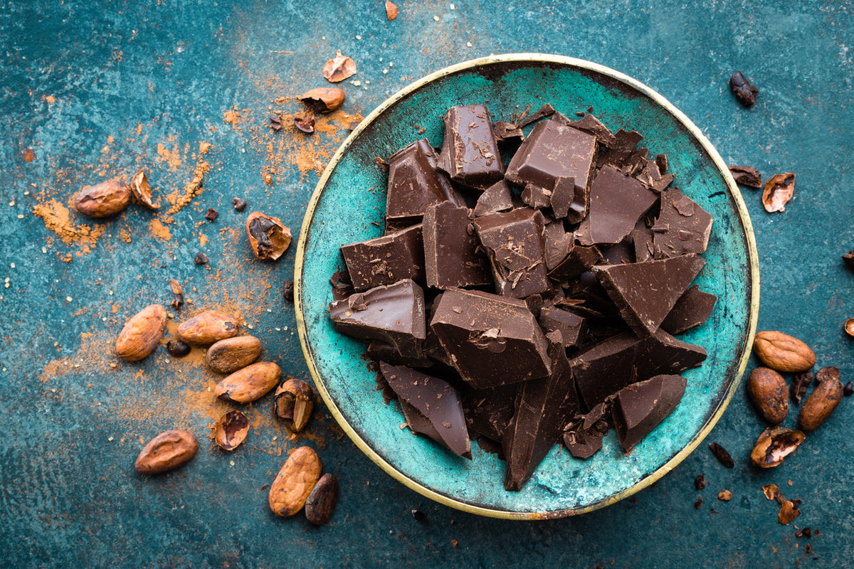 Squares of dark chocolate with cacao nibs