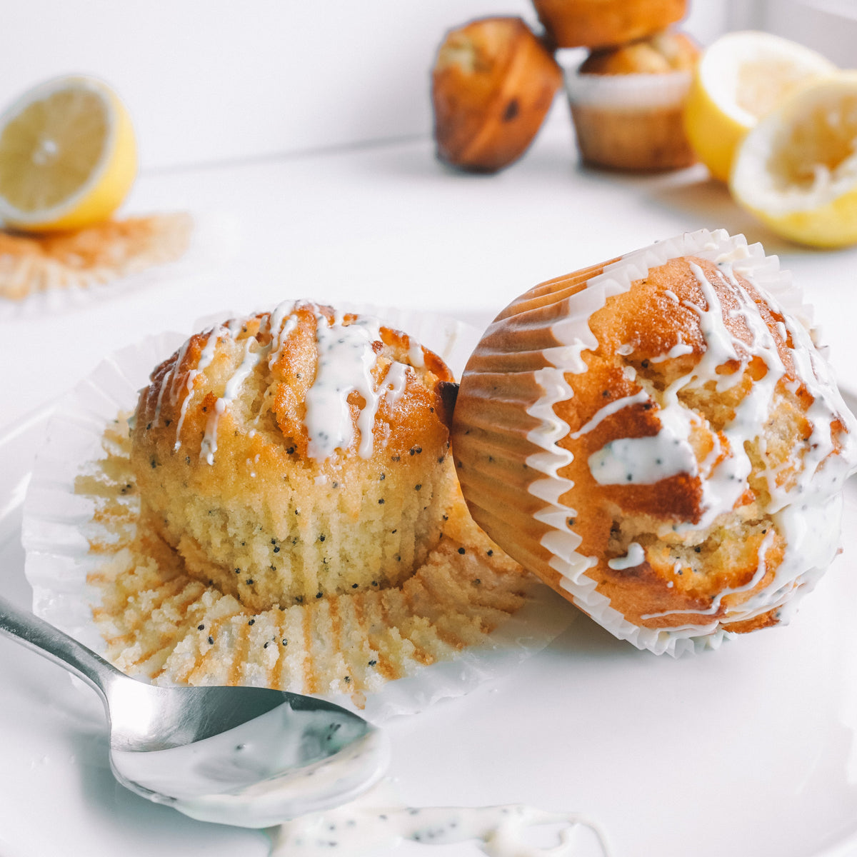Lemon and poppyseed muffins with chocolate chunks and lemon glaze