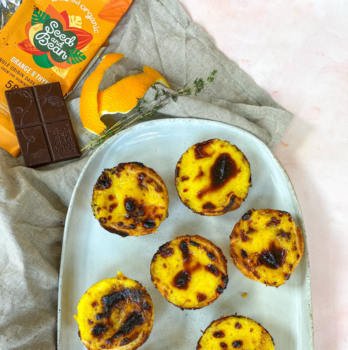 Homemade orange and thyme pastel de nata custard tarts