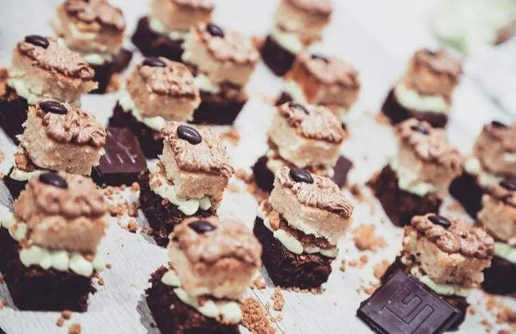 Mini vegan avocado chocolate brownie and vanilla sponge cakes