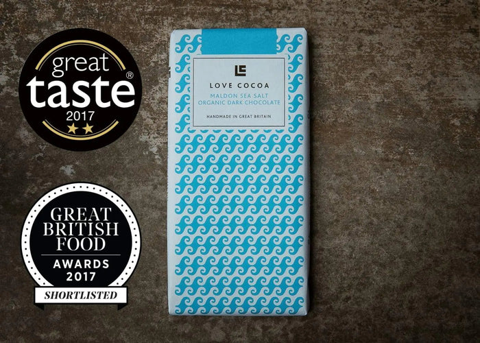 Sea salt dark chocolate bar with a glass of red wine