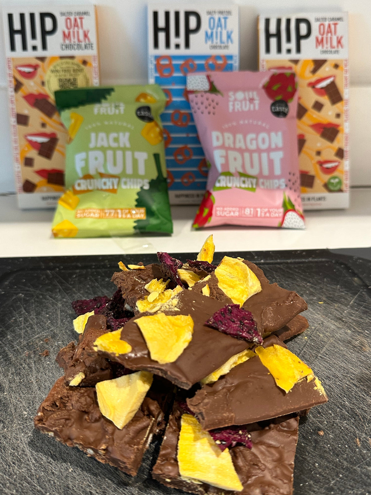 Vegan chocolate bark topped with dried fruit pieces