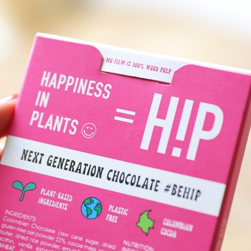 H!P chocolate bar in compostable wood pulp wrapper