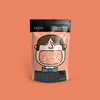 COCO Sour Apple Sweets 100g, front of pouch on a coral background