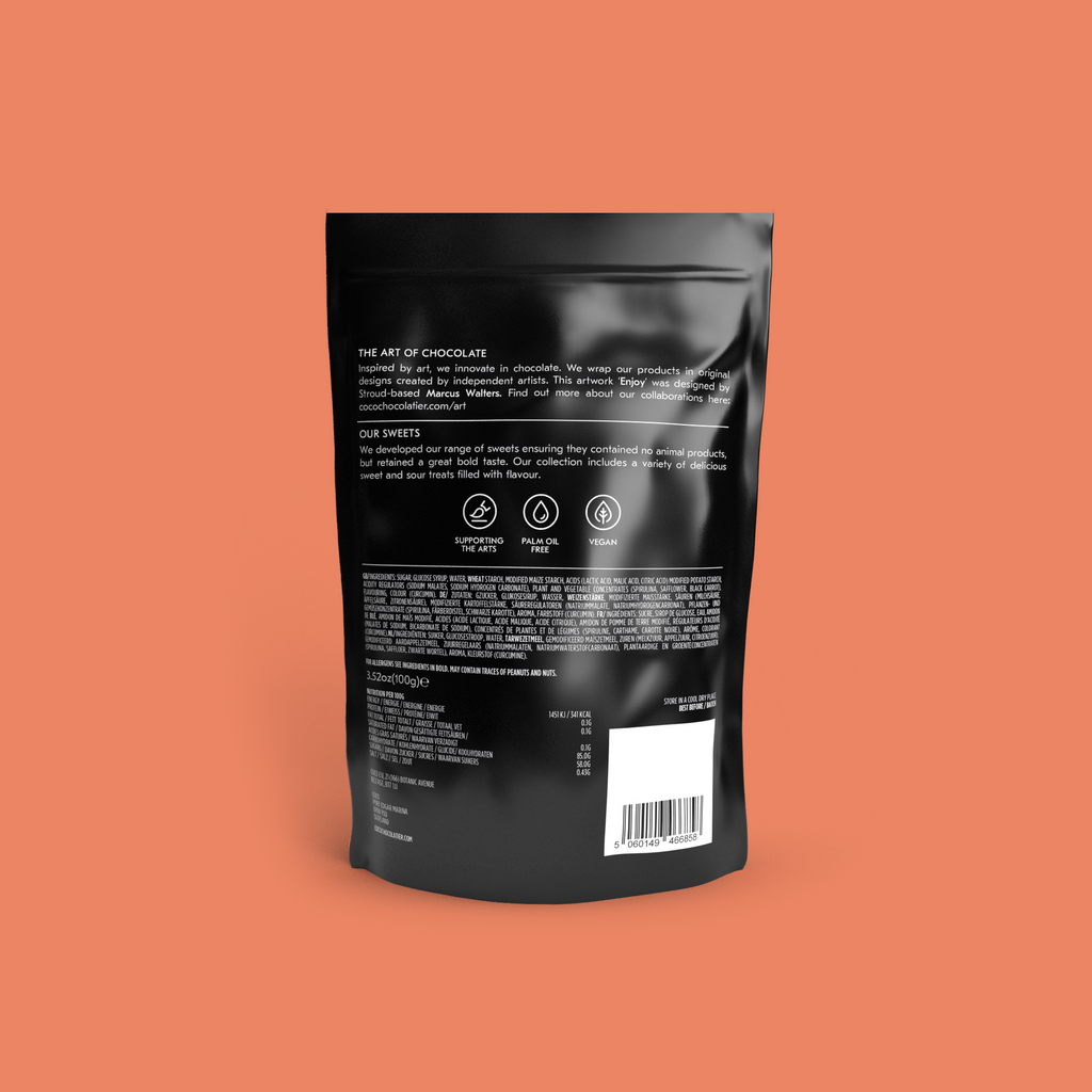 COCO Sour Apple Sweets 100g, back of pouch on a coral background