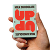 UP-UP Original Milk Chocolate 60g, bar held in hand