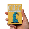 OTHERLY Salted Caramel Oat M!lk Chocolate 60g, bar held in hand