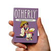 OTHERLY Cherry Oat M!lk Chocolate 60g, bar held in hand