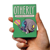 OTHERLY Birthday Cake Oat M!lk Chocolate 60g, bar held in hand