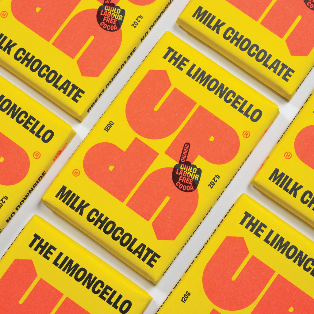 UP-UP The Limoncello Milk Chocolate 120g, close-up of packs laid out diagonally