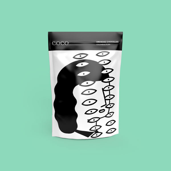 COCO Colombian Plain Drinking Chocolate 200g, front of pouch on a mint background