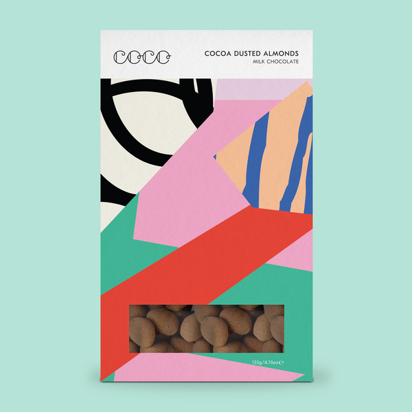COCO Cocoa Dusted Almonds 135g, front of box with window on a mint background