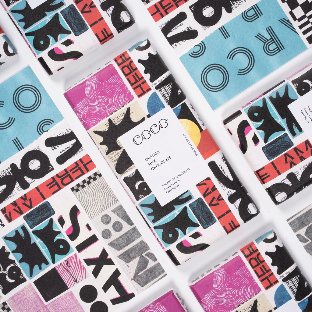 COCO Orange Milk Chocolate bar, packs laid out diagonally