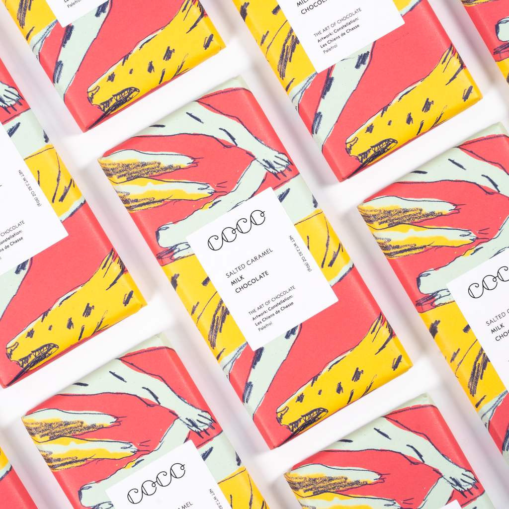 COCO Salted Caramel Milk Chocolate bar, packs laid out diagonally