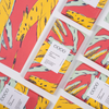 COCO Salted Caramel Milk Chocolate bar, close-up of packs laid out diagonally