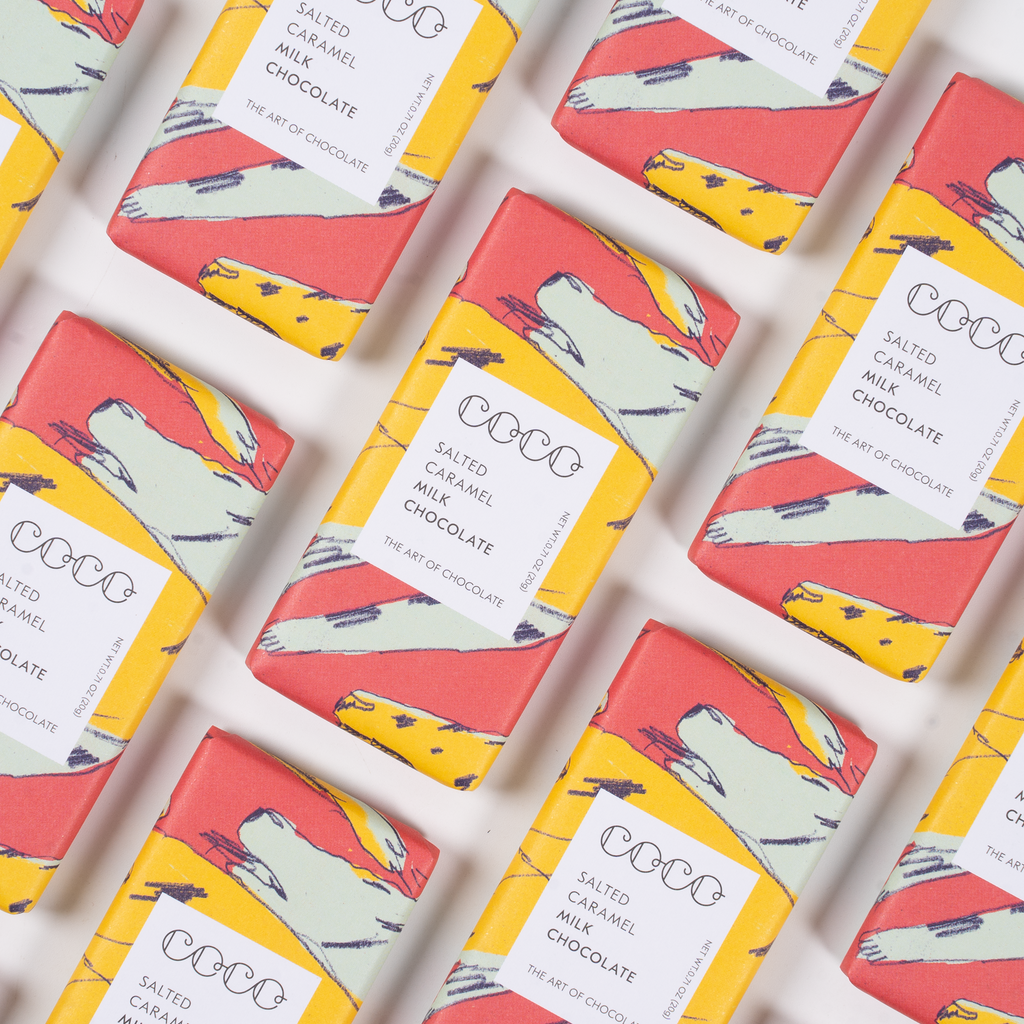 COCO Salted Caramel mini bar, rows of packs laid out diagonally