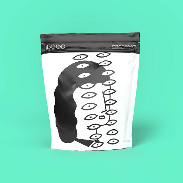 COCO Colombian Plain Drinking Chocolate 1kg, front of pouch on a mint background