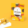 Love Cocoa Honeycomb 41% Milk Chocolate Bar, pack with pieces of honeycomb on a yellow background