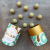 Love Cocoa Caramel Confetti Birthday Cake Truffles, open truffle tube with truffles scattered