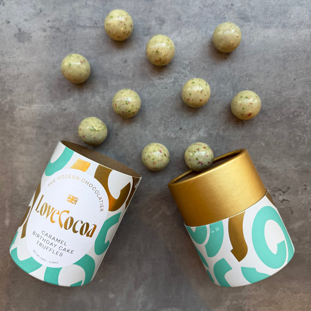 Love Cocoa Caramel Confetti Birthday Cake Truffles, open truffle tube with truffles scattered