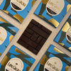 Love Cocoa Peruvian Dark Chocolate Bar, unwrapped dark bar on a stack of packs