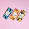 Love Cocoa Mini Honeycomb 41% Milk Chocolate Bar, three packs on a pink background