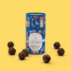 Love Cocoa London Edition Salted Caramel Truffles tube, truffle tube with truffles on a yellow background