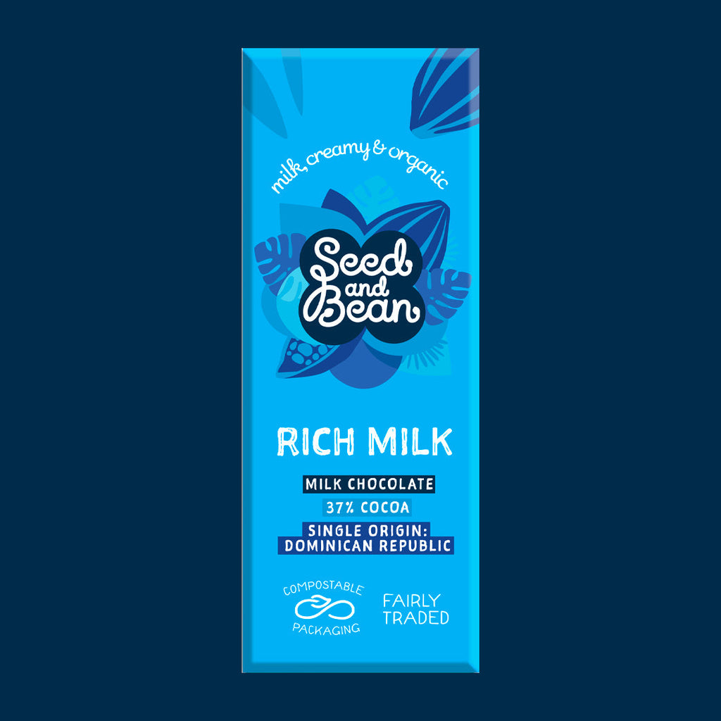 Seed & Bean Rich Milk Chocolate 25g mini bar, front of pack on a dark blue background