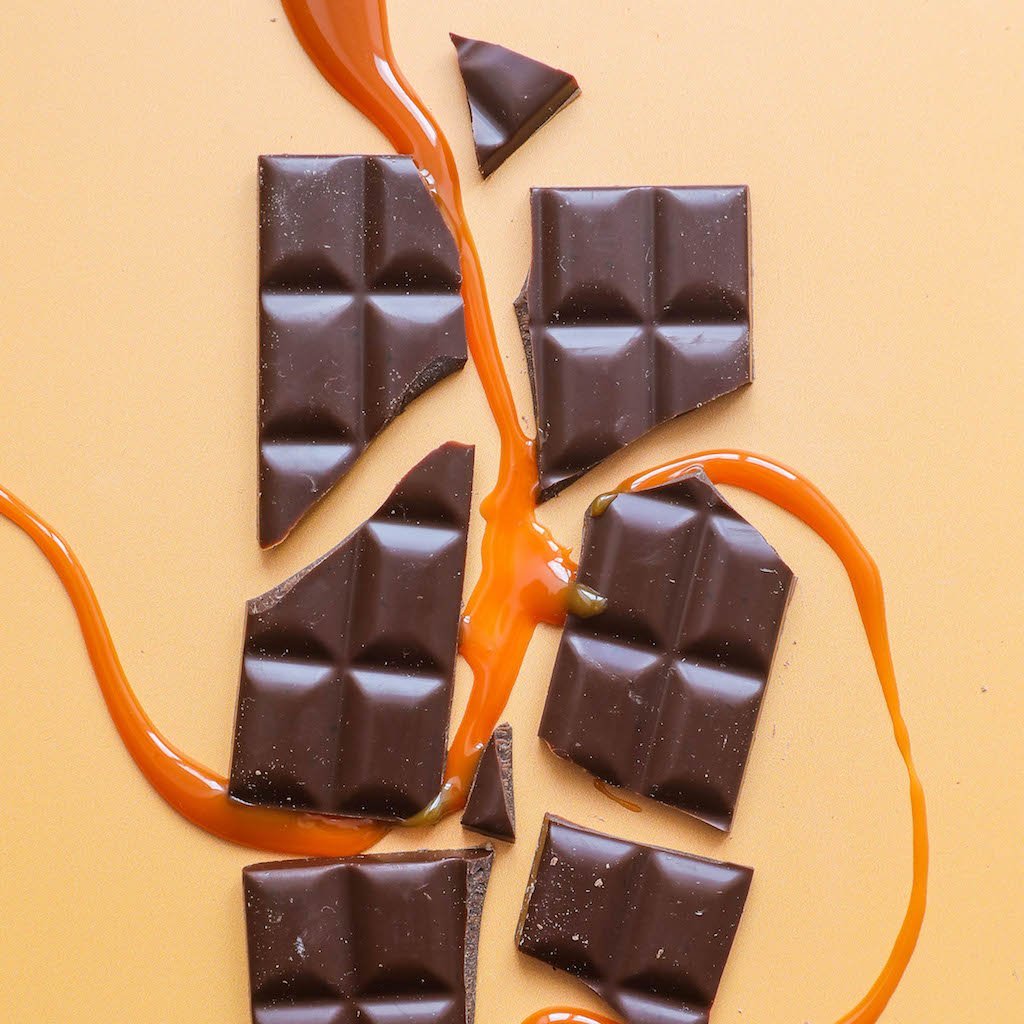 H!P Salted Caramel Oat M!lk Chocolate bar, chocolate pieces with caramel drizzle